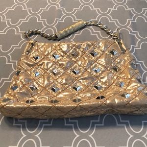 Used gold mirror purse